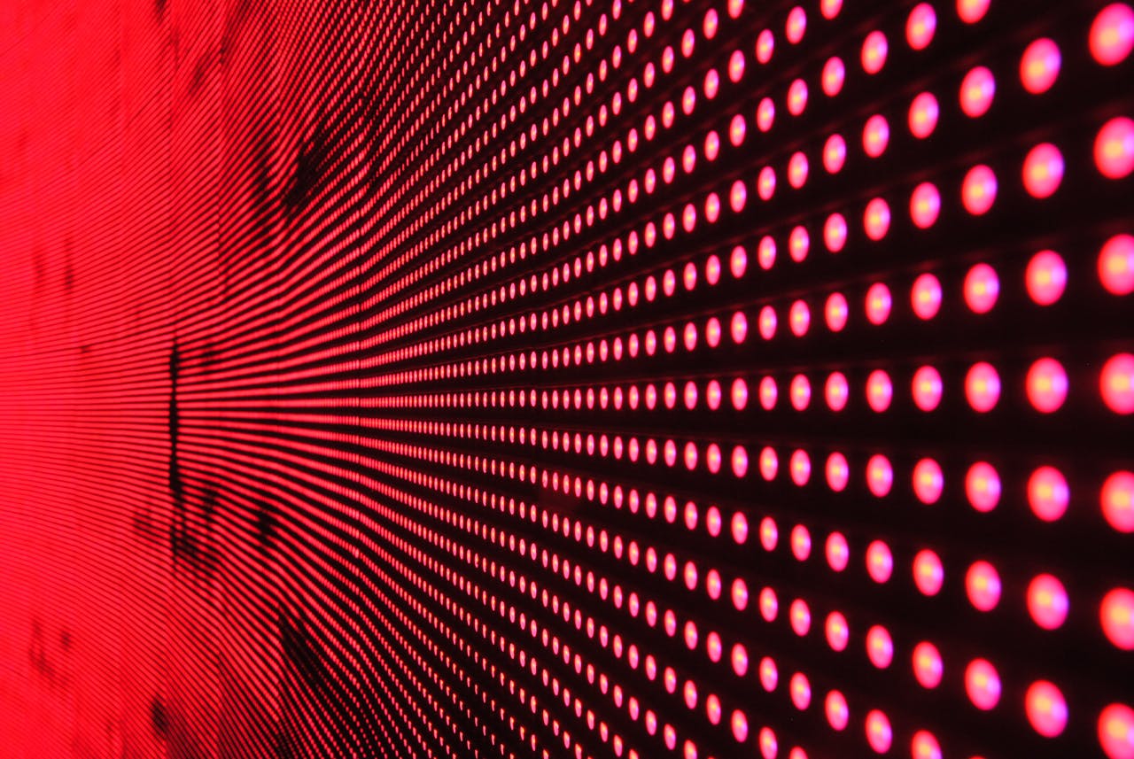 journey Vibrant abstract pattern of illuminated red LED lights forming a dynamic design.